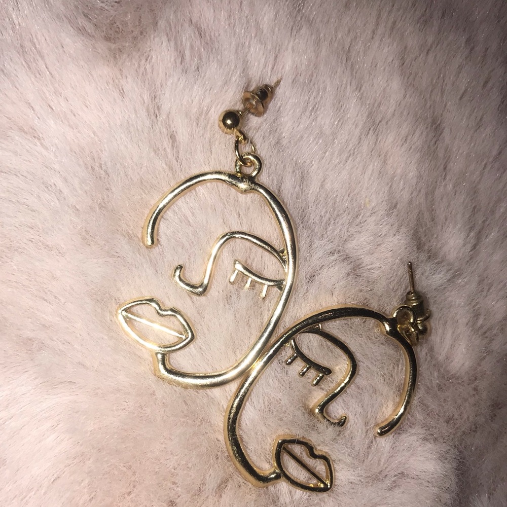 Brand new abstract face earrings